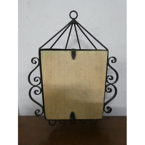 238 - A vintage ceramic Parrot tile in metal cage.