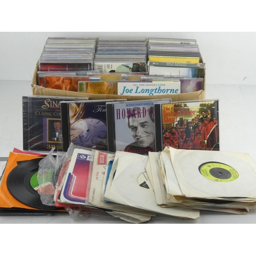 460 - A mixed lot of Irish cd's and vintage 45's to include Boomtown Rats, The Pretenders and more.