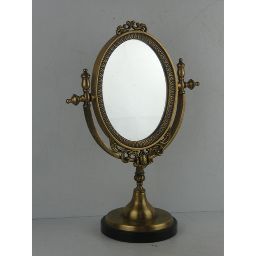 462 - A metal framed table top mirror.