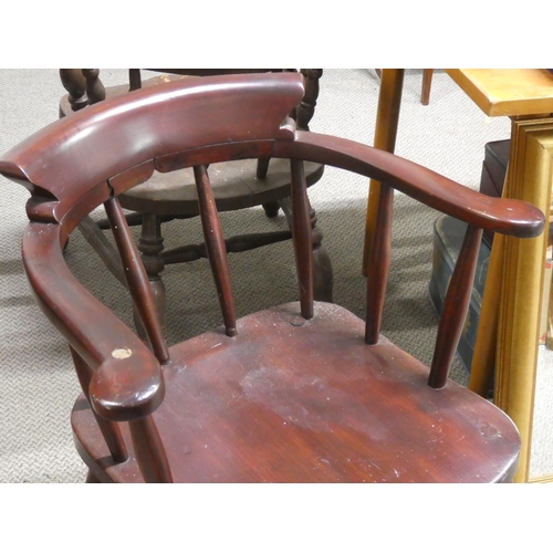 468 - An antique bow back smokers chair..