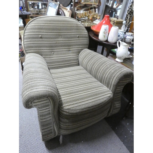 471 - A vintage overstuffed armchair.