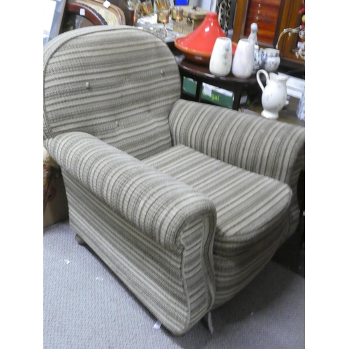 471 - A vintage overstuffed armchair.