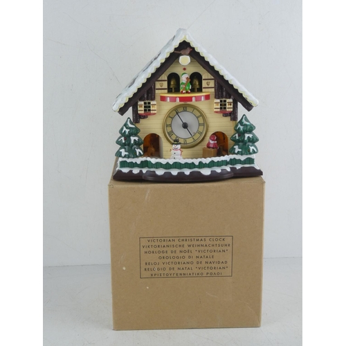 478 - A boxed Victorian style Christmas Clock.