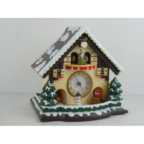 478 - A boxed Victorian style Christmas Clock.