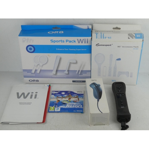 486 - A lot of Nintendo WII accessories and a controller.