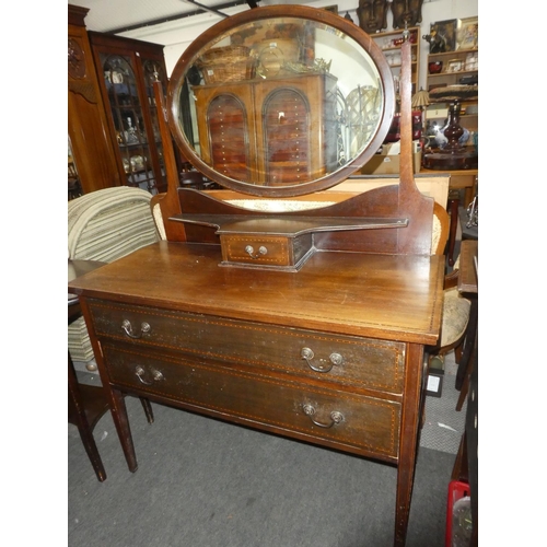 488 - An antique mahogany and inlay dressing table.