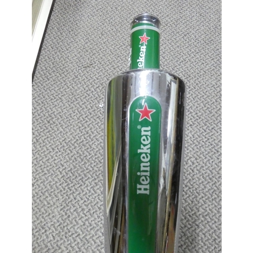 215 - A Heineken beer tap/ pump.