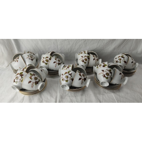 202 - A large vintage floral patterned Polish tea set.