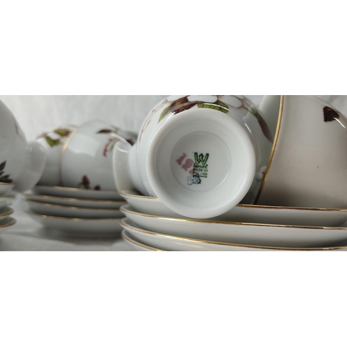 202 - A large vintage floral patterned Polish tea set.
