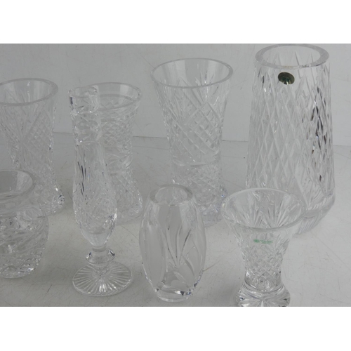 61 - A large lot of assorted crystal vases to include Tyrone and Galway crystal.