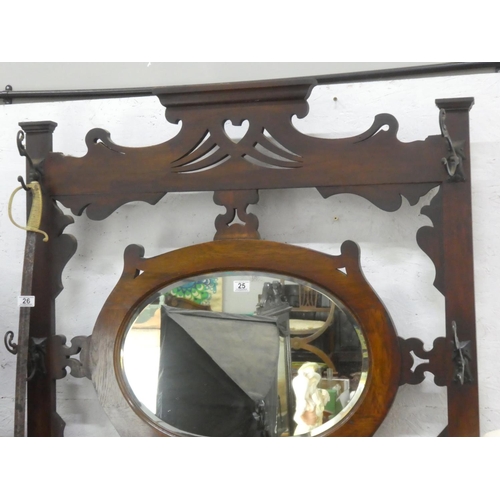 25 - A stunning antique mahogany mirror back hall stand with original scroll hooks (one missing).
