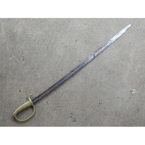 26 - An antique brass handled sword.