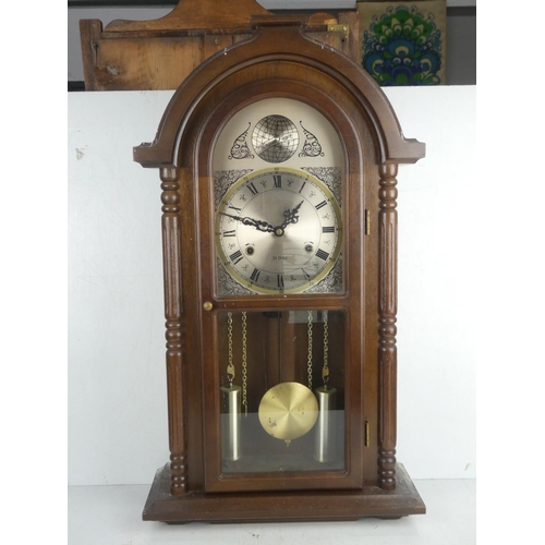 27 - A vintage wood cased Tempus Fugit 31 day wall clock.