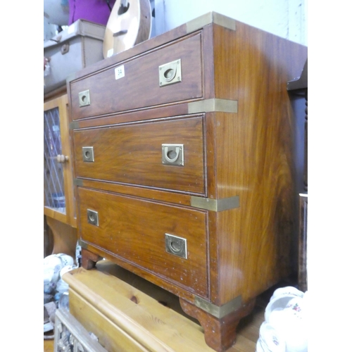 34 - A stunning chest of three drawers with brass detail, 59cm x 60cm x 38cm.