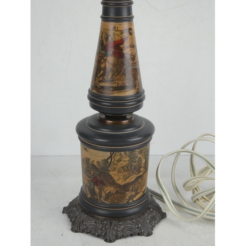 35 - A stunning vintage wrought iron based table lamp with decorative panels and glass shade.