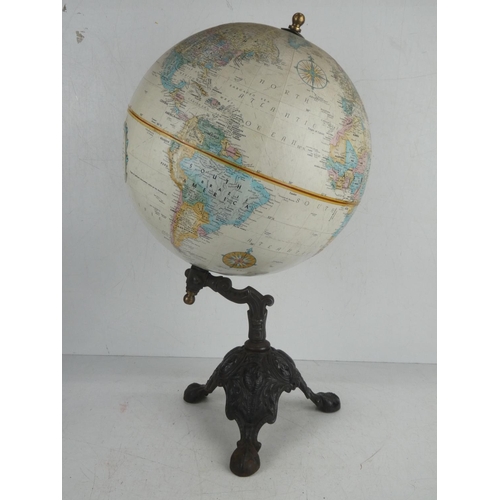 40 - A stunning vintage globe on original early cast iron base.