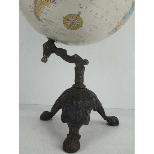 40 - A stunning vintage globe on original early cast iron base.