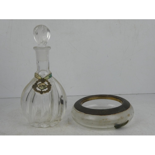5 - A vintage glass decanter with original label and a vintage dressing table jar.