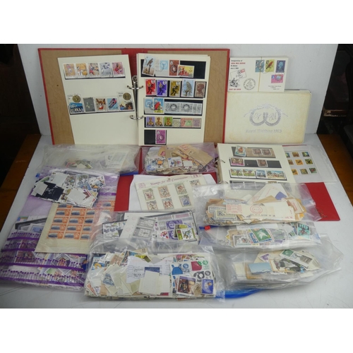 7 - A large collection of vintage stamps including a Stanley Gibbons 'Royal Wedding 1973 stamp album', a... 