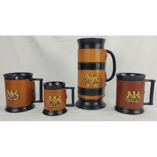 108 - Four vintage Sylvac leather and crested panel tankards.
