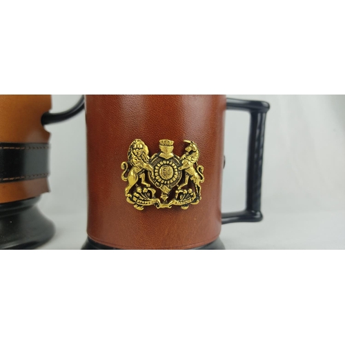 108 - Four vintage Sylvac leather and crested panel tankards.