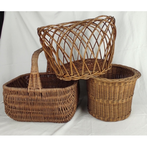 117 - A vintage wicker waste paper basket, a vintage wicker shopping basket and another.
