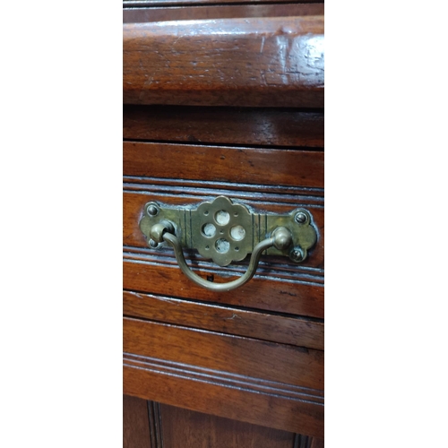 121 - A stunning antique mahogany two door bookcase with detailed brass brackets, 214cm x 105cm x 42cm.