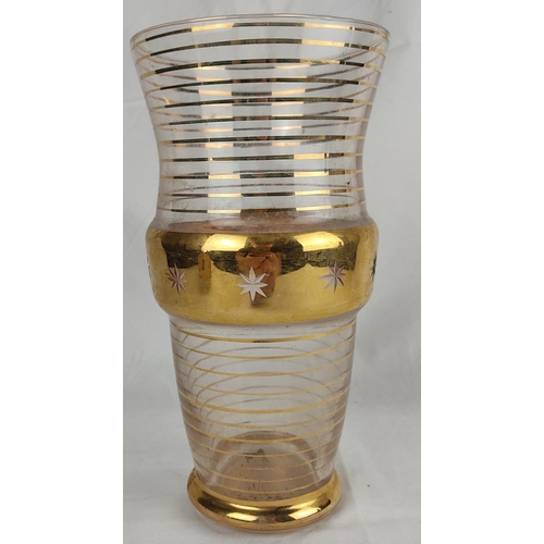 149 - A vintage glass vase with gilt detail.