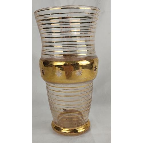 149 - A vintage glass vase with gilt detail.