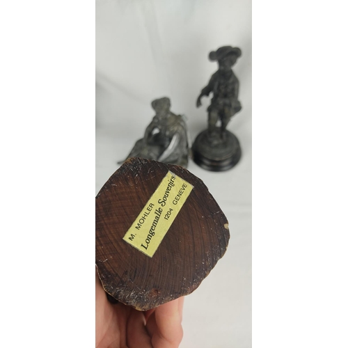156 - A pair of antique spelter figures, a Longemalle Souvenir figure and more.