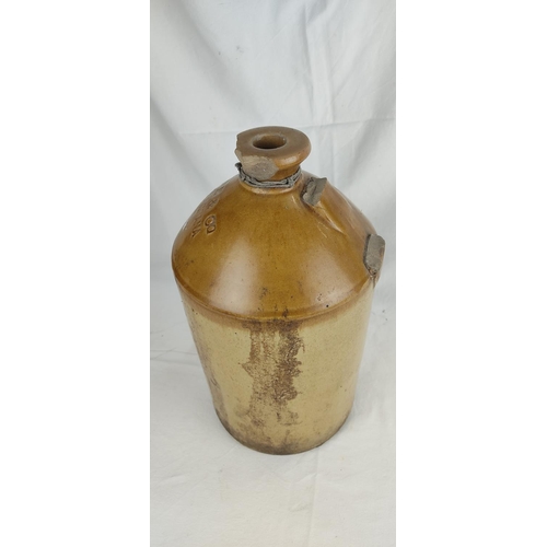 189 - An antique flagon 'P O'Kane & Co, Derry & Buncrana' (a/f), 33cm.