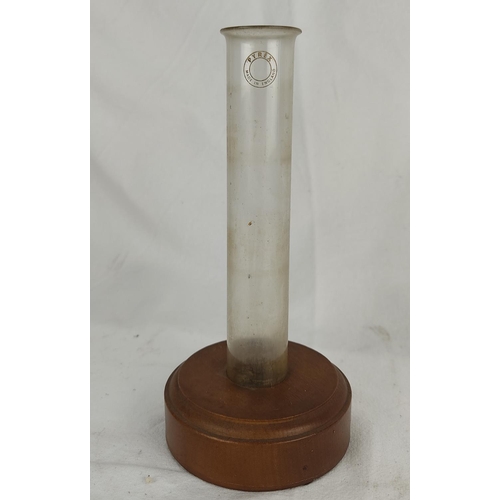 100 - An unusual vintage Pyrex glass testtube in a wooden stand.