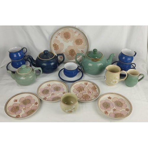 65 - A lot of Denby, to include three teapots & more.