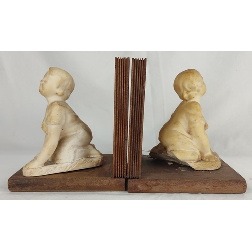72 - A pair of antique bookends with porcelain figures (a/f).