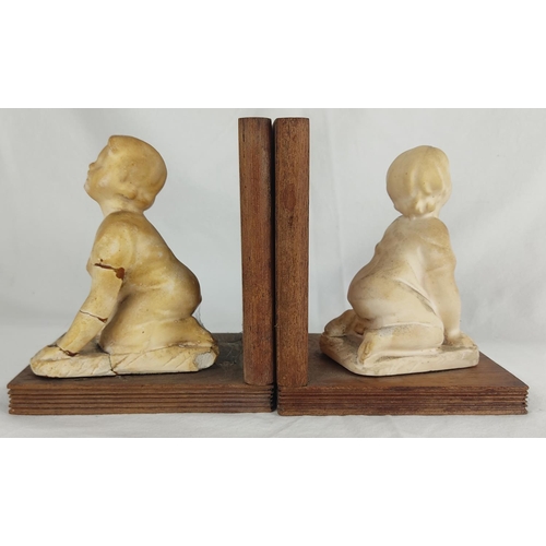 72 - A pair of antique bookends with porcelain figures (a/f).