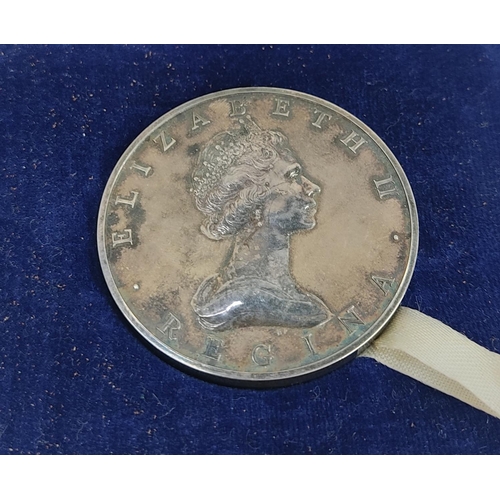 78 - A cased Silver Elizabeth II Regina Northern Ireland 1921 - 1971 anniversary medal.