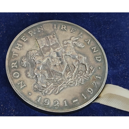 78 - A cased Silver Elizabeth II Regina Northern Ireland 1921 - 1971 anniversary medal.