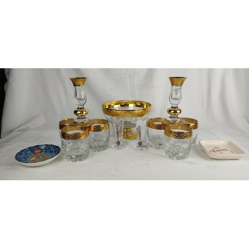 209 - A set of six gilt detail glasses, a pair of candlesticks and similar bowl, a pair of Sambuca glasses... 