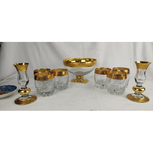 209 - A set of six gilt detail glasses, a pair of candlesticks and similar bowl, a pair of Sambuca glasses... 