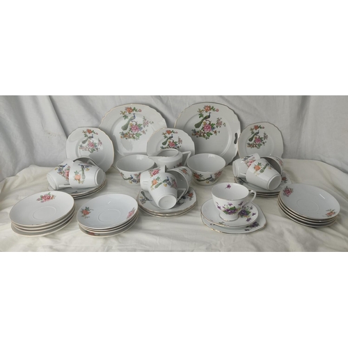 218 - A vintage porcelain teaset and more.