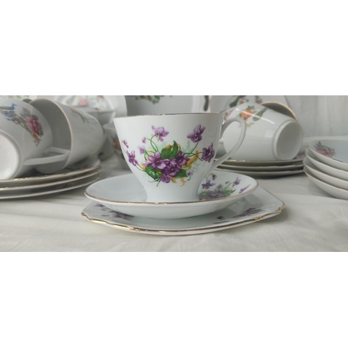 218 - A vintage porcelain teaset and more.