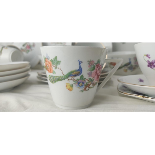 218 - A vintage porcelain teaset and more.