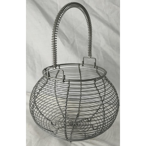 234 - A vintage wire egg basket.