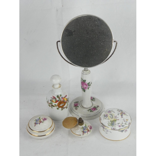 318 - A decorative dressing table mirror, atomizer & more.