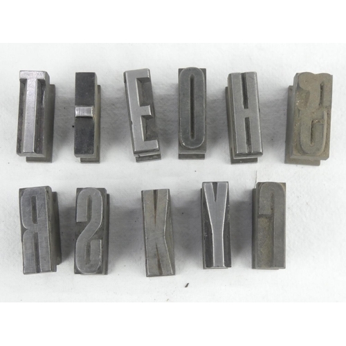 332 - An assortment of lead typeset/ Letterpress letters.