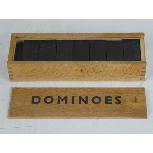 357 - A vintage cased set of dominos.