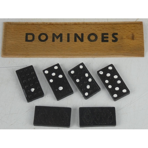 357 - A vintage cased set of dominos.