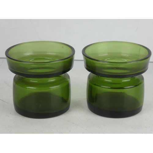 358 - A pair of vintage Danish green glass candlesticks.