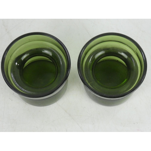 358 - A pair of vintage Danish green glass candlesticks.