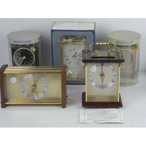 373 - A collection of 5 ex shop stock clocks.